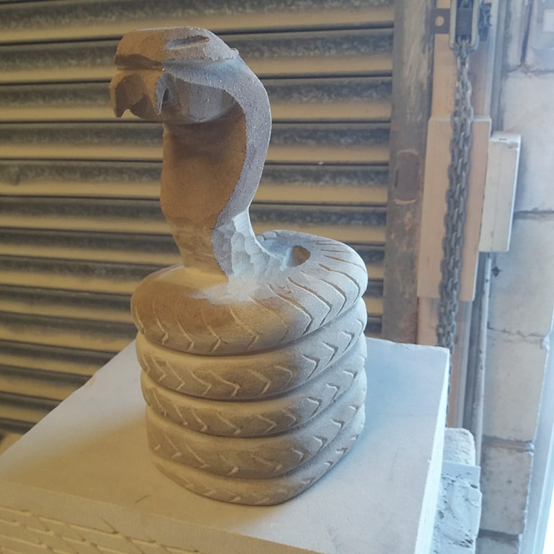 Stone Carved Serpent Candle Holder